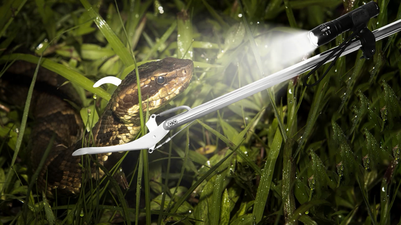 Illuminate and Capture: Snake Tongs with Flashlight in Handling Reptiles Safely in Night